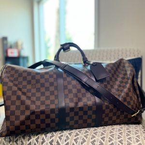 LOUIS VUITTON KEEPALL BANDOULIÈRE 55 Retail $2,570 + Tax  selling $2,000
